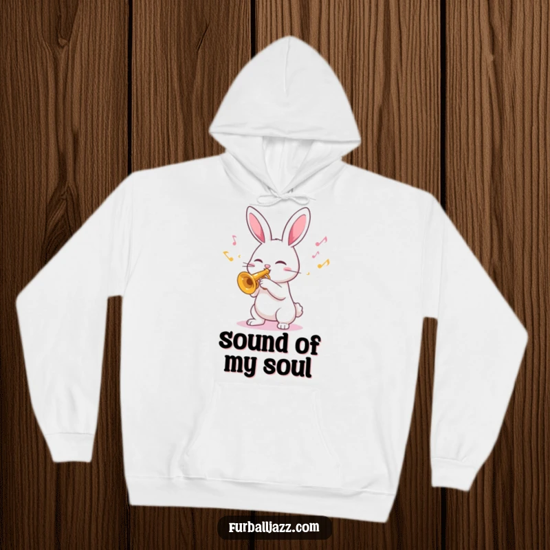 Funny Hoodie depicting a beaming rabbit enthusiastically playing a trumpet, surrounded by cheerful, colorful musical notes.
