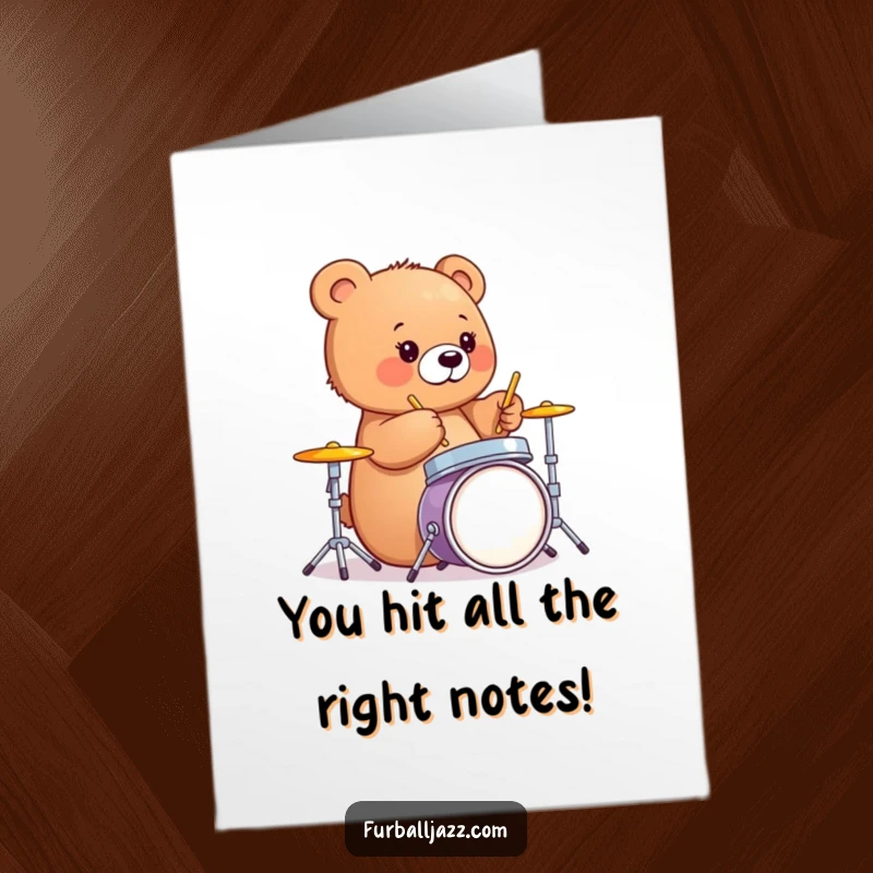 Funny Free Printable Congrats Card: Happy bear cub beating a drum set, celebrating a major accomplishment.