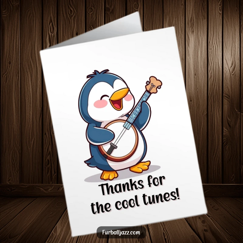 Funny Free Printable Thank You Card: A penguin happily strums a banjo, offering a musical thank you with a beaming smile.