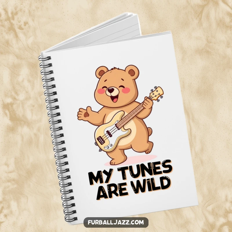 Funny Bear Notebook with a bear doing a happy jig while playing a bass guitar, perfect for capturing musical ideas.