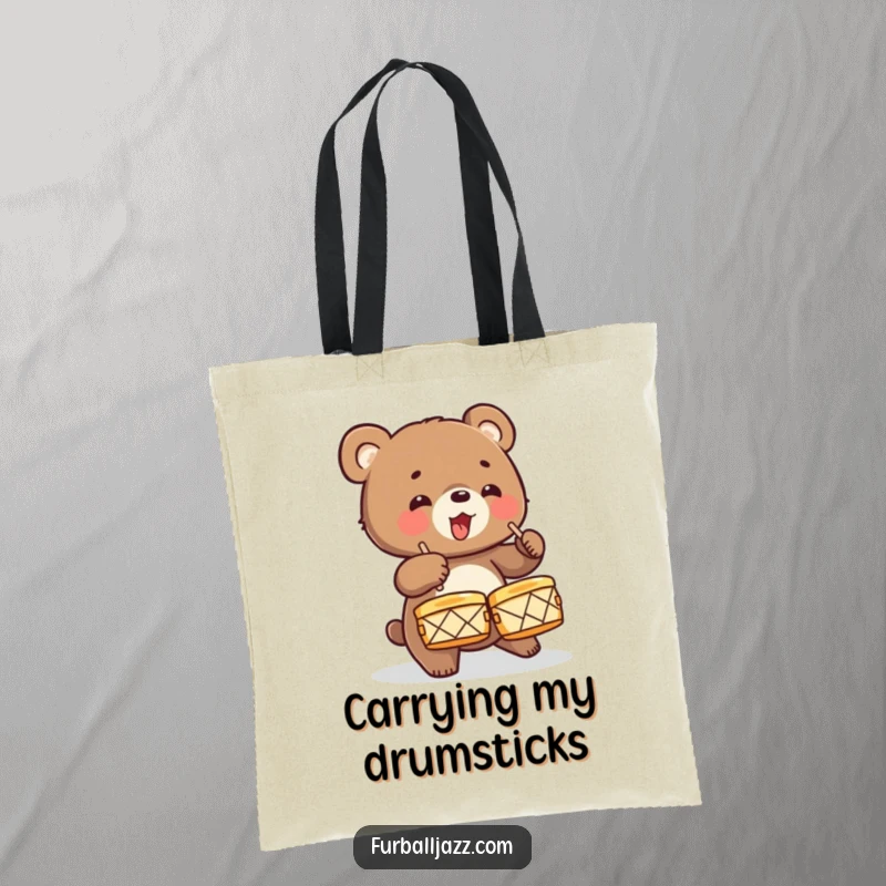 Funny Bear Cub Drummer Tote Bag showcasing an energetic cub crashing cymbals, perfect for carrying music gear or daily essentials with wild style.